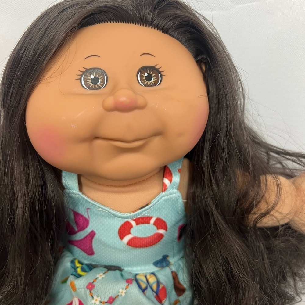 Charming Cabbage Patch Doll with Long Black Hair and Striped Dress - Picture 4 of 4
